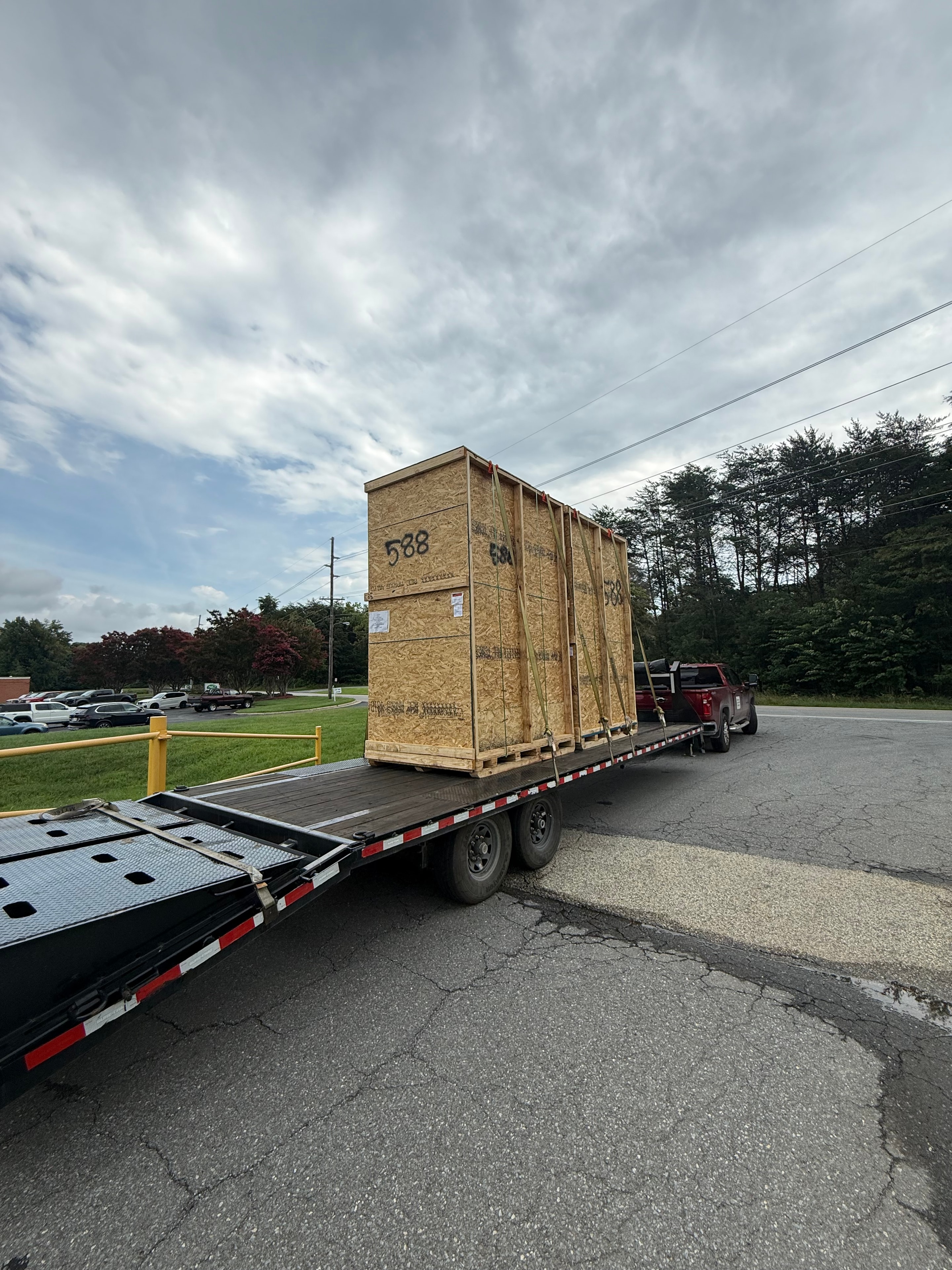 Wooden crate cargo on flatbed trailer